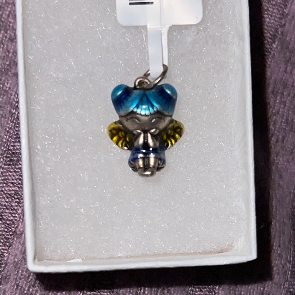 Adorable Angel charm.I found a jeweler to make some neat colored sterling